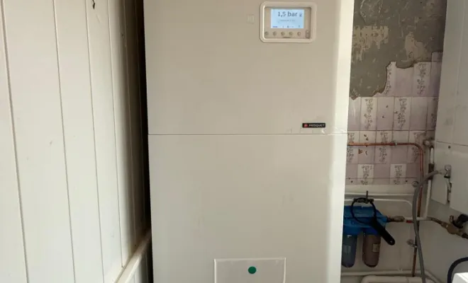 Installation d'une pompe à chaleur air-eau FRISQUET à Gargenville (Yvelines), Versailles, I.S.T.F